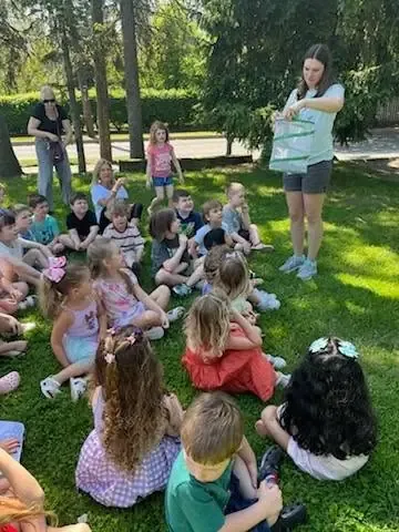 Children participating in hands on garden learning